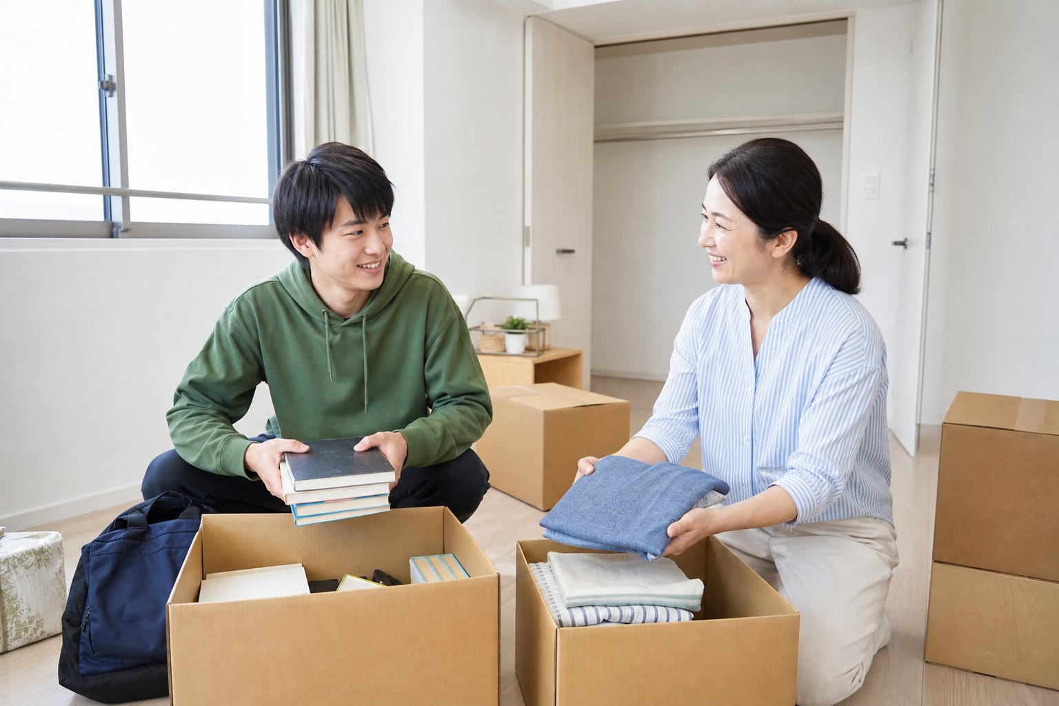 親子で余裕を持って引越し準備をする様子